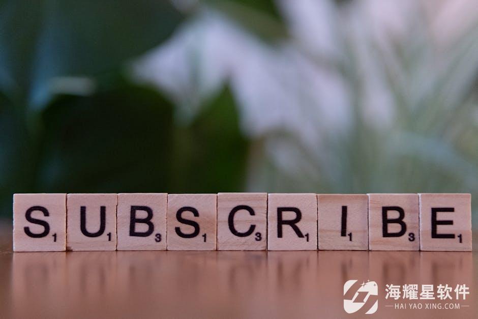 Close-up of the word 'SUBSCRIBE' spelled with wooden letter tiles on a table.