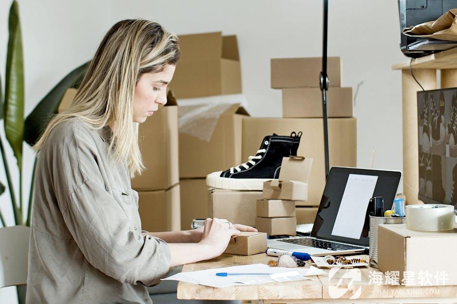 A woman packing boxes for her online store, surrounded by packaging materials and a laptop.