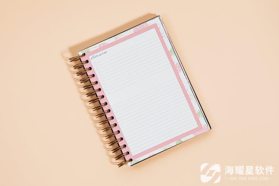 Minimalist top view of an open notebook on a soft yellow background. Ideal for stationery or productivity themes.
